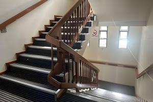 a spiral staircase in a building with a stair case at LN Flats & Suites in Uberlândia