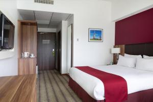 Postel nebo postele na pokoji v ubytování Holiday Inn Lille Ouest Englos by IHG