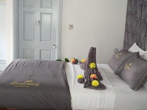 Rúm í herbergi á Lovely Studio Apartment in Soufriere from Claviers