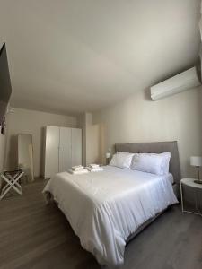 Postel nebo postele na pokoji v ubytování 7Suites
