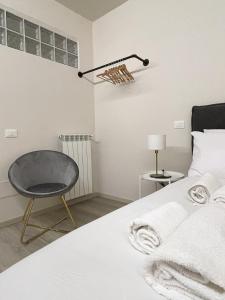 Postel nebo postele na pokoji v ubytování 7Suites