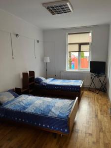 Postel nebo postele na pokoji v ubytování Rom Rems + 2 fotografie