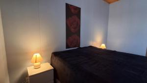 Ένα ή περισσότερα κρεβάτια σε δωμάτιο στο Lakevew House Kangasniemi