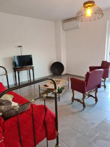 Televisyen dan/atau pusat hiburan di Appartement confort +21 gambar