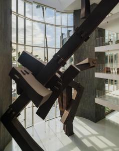 a large metal sculpture in a building at Plus Fariones Suite Hotel in Puerto del Carmen