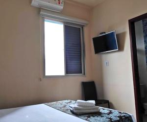 TV a/nebo společenská místnost v ubytování Hotel Minastur
