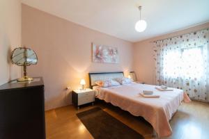 Postel nebo postele na pokoji v ubytování Holiday House MERI, 5+2, Benkovac