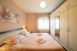 Postel nebo postele na pokoji v ubytování Holiday House MERI, 5+2, Benkovac