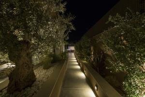 A garden outside Almi-Cove Hilltop Villas