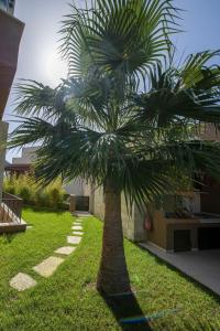 A garden outside Almi-Cove Hilltop Villas