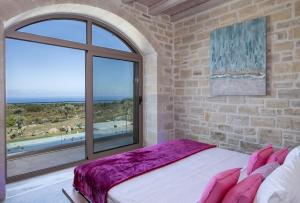 Posteľ alebo postele v izbe v ubytovaní Villa AuroraLuxurius Living