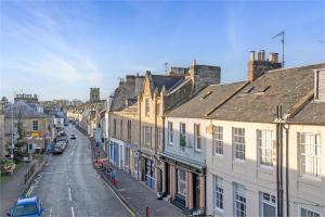a view of a city street with buildings at Thistle Nook in Coldstream