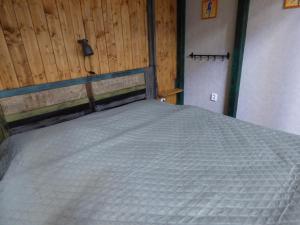 Ліжко або ліжка в номері Apartmány za Plotem