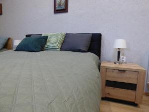 Ліжко або ліжка в номері Apartmány za Plotem