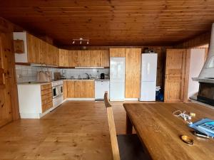 Kuchyň nebo kuchyňský kout v ubytování Lakecottage