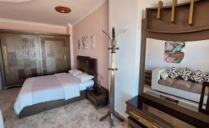 Postel nebo postele na pokoji v ubytování Seafront apartment G311