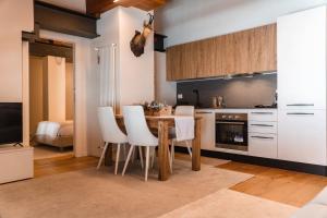 Η κουζίνα ή μικρή κουζίνα στο Suite Boisée - Maison Poluc trilocale