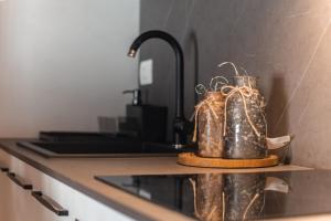 Η κουζίνα ή μικρή κουζίνα στο Suite Boisée - Maison Poluc trilocale