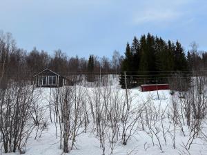 Modernized standalone cabin Sørreisa - Bardufoss v zimě