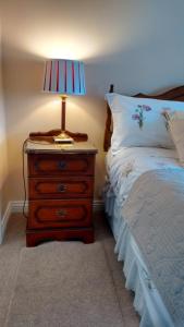 Voodi või voodid majutusasutuse Corrib View Guesthouse h91rr72 toas