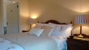 Voodi või voodid majutusasutuse Corrib View Guesthouse h91rr72 toas