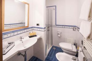 Kúpeľňa v ubytovaní Hotel Raito Wellness & SPA