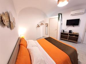 Postel nebo postele na pokoji v ubytování Il Vicolo b&b