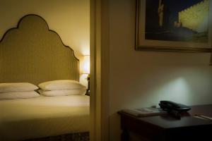 Letto o letti in una camera di Jerusalem Gold Hotel