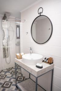A bathroom at Michalis Apartment with Outdoor Jacuzzi
