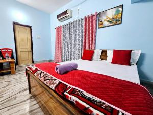 Krevet ili kreveti u jedinici u okviru objekta Hotel Shiv shakti residency
