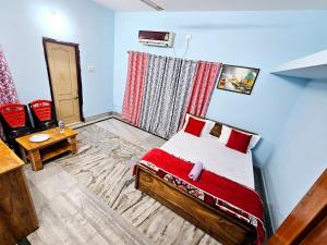 Krevet ili kreveti u jedinici u okviru objekta Hotel Shiv shakti residency