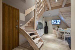 Televízia a/alebo spoločenská miestnosť v ubytovaní Smrekowa Polana Resort & Spa