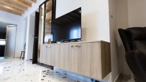 TV a/nebo společenská místnost v ubytování Mountain Maison