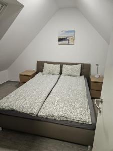 Postel nebo postele na pokoji v ubytování Apartma Zala