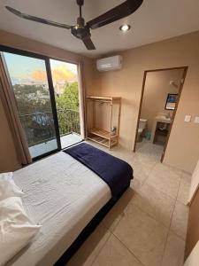 Ένα ή περισσότερα κρεβάτια σε δωμάτιο στο Torre 70, departamento 12