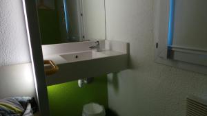 Koupelna v ubytování ENZO Hotels 1er PRIX