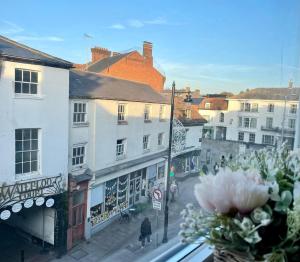 a view of a city street with buildings at Studio Flat with Parking Off High St in Andover