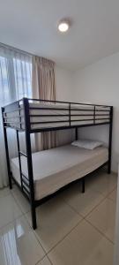 Postel nebo postele na pokoji v ubytování River Cloud Apartment Shared