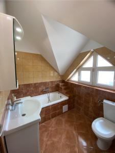 Koupelna v ubytování Korall Apartman