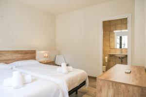 Posteľ alebo postele v izbe v ubytovaní Can Cintet 1- Apartamento en la plaza de Besalú