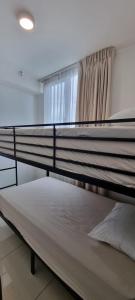 Postel nebo postele na pokoji v ubytování River Cloud Apartment Shared