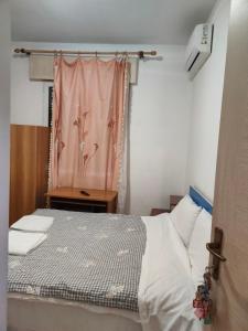 Postel nebo postele na pokoji v ubytování Bella cina