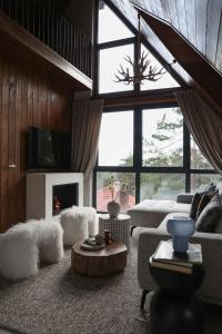 Zona de estar de Gigi Mountain Home