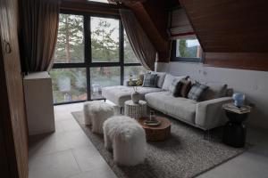 Zona de estar de Gigi Mountain Home