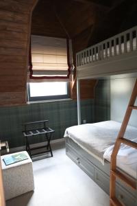 Cama o camas de una habitación en Gigi Mountain Home
