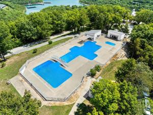 an overhead view of a large estate with a swimming pool at Ozark Vista 129 in Kimberling City
