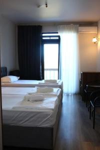 Letto o letti in una camera di Majestic