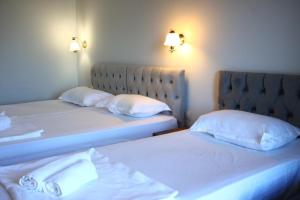 Letto o letti in una camera di Majestic