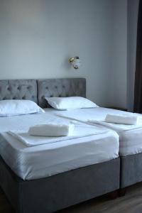 Letto o letti in una camera di Majestic