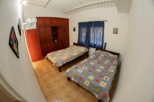 Hospedaje las Brisas de Rivera客房内的一张或多张床位